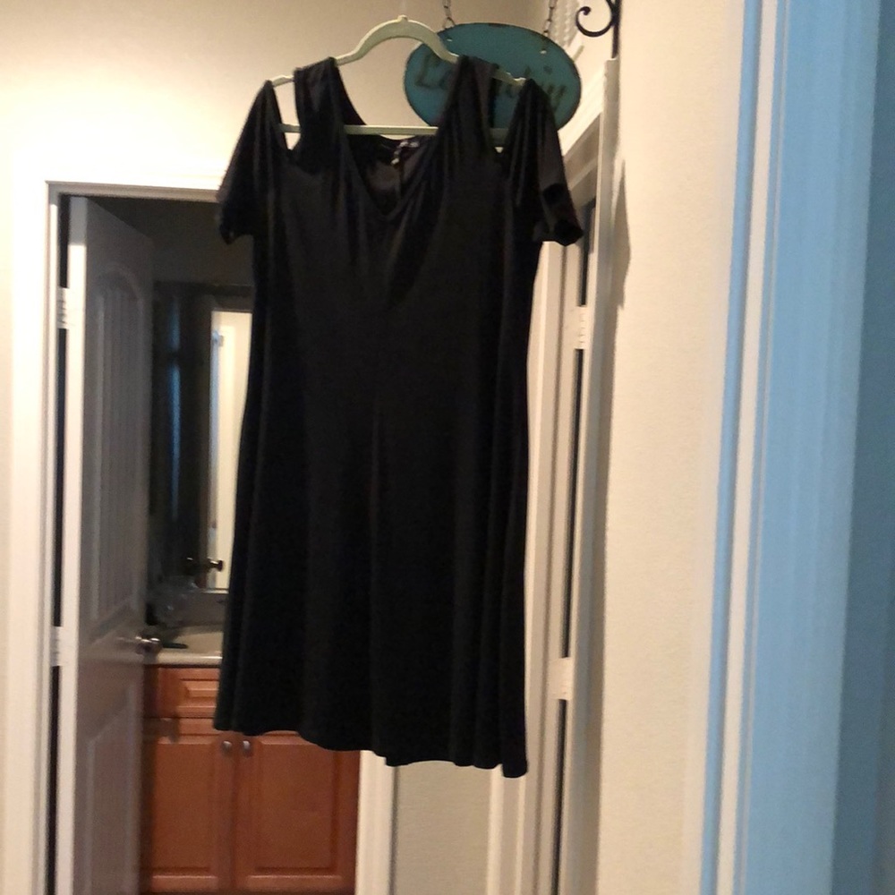 Black cold shoulder dress.